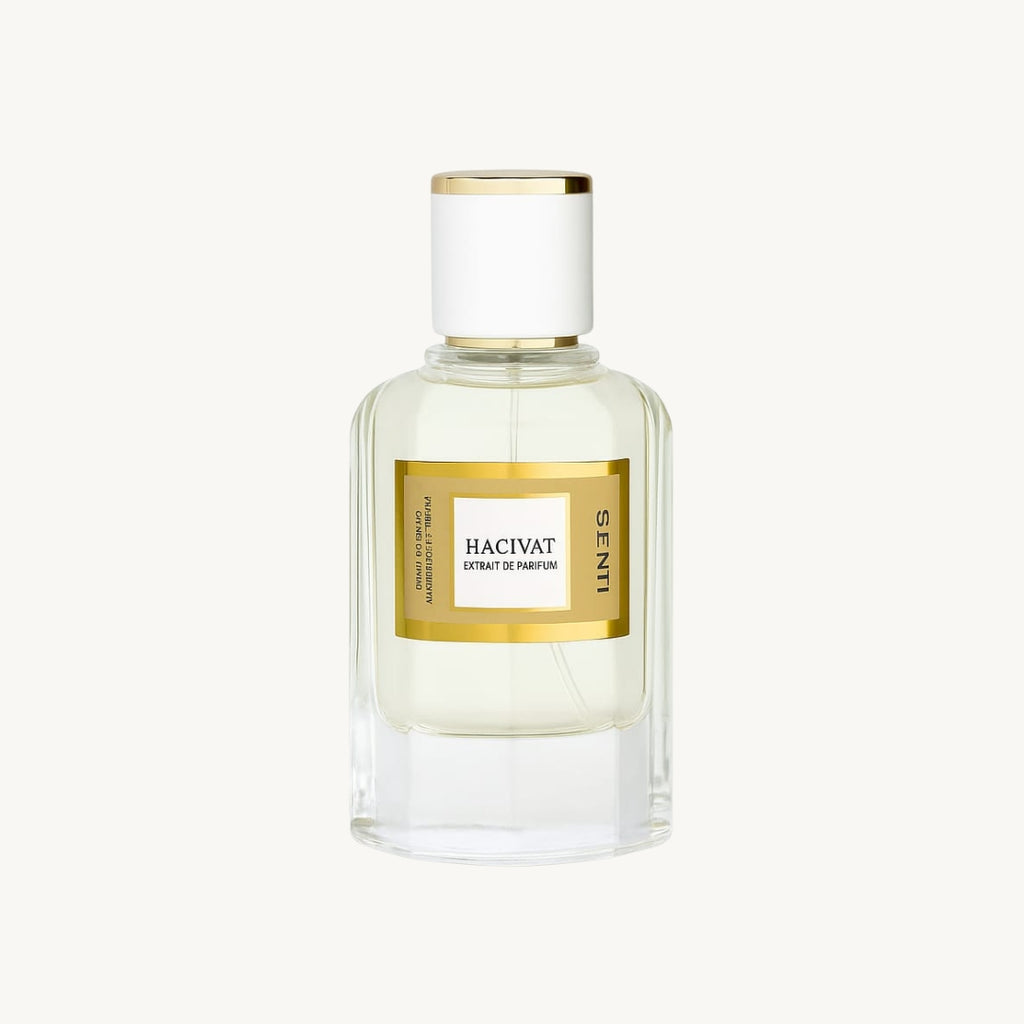 Perfume bottle with gold label on a white background