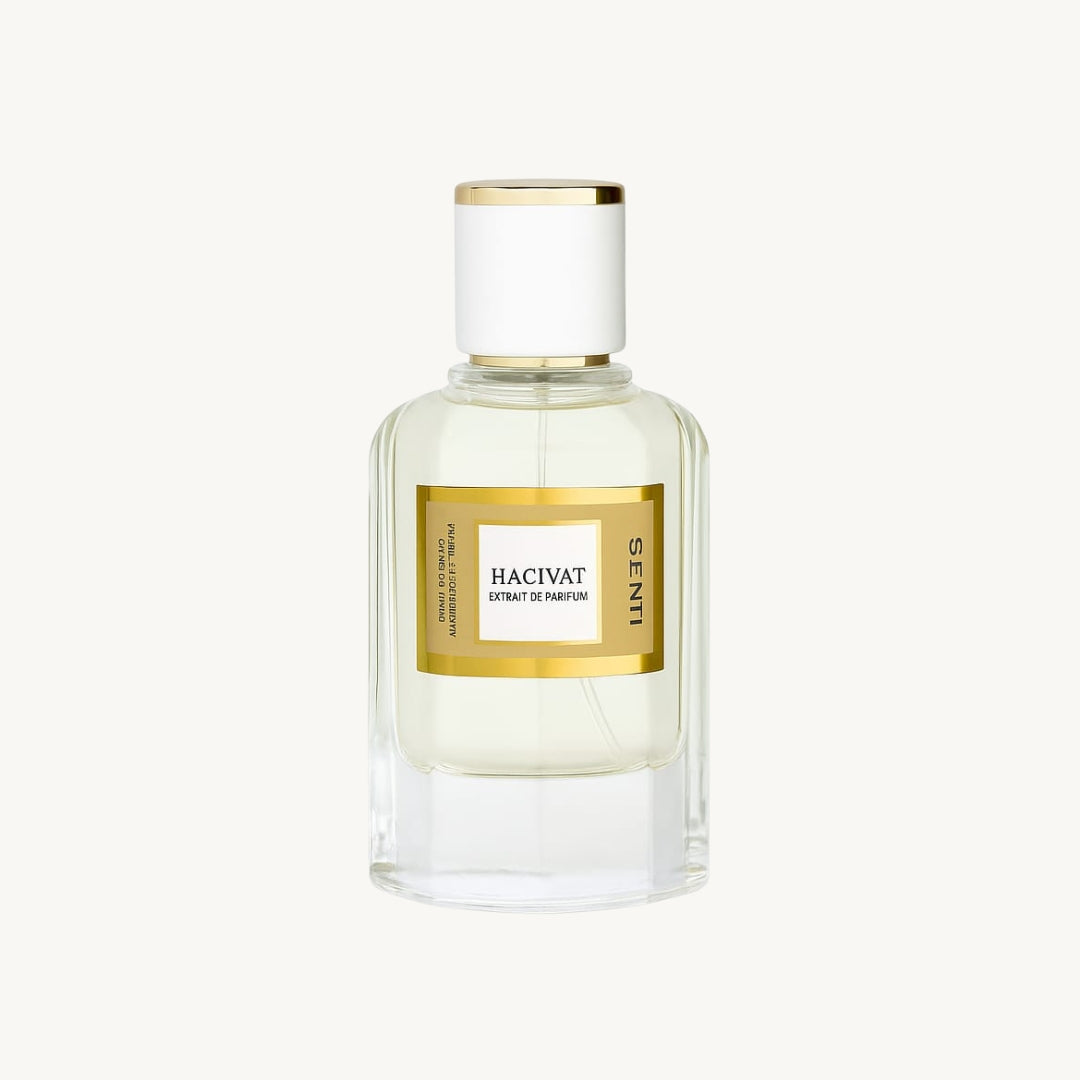 Perfume bottle with gold label on a white background