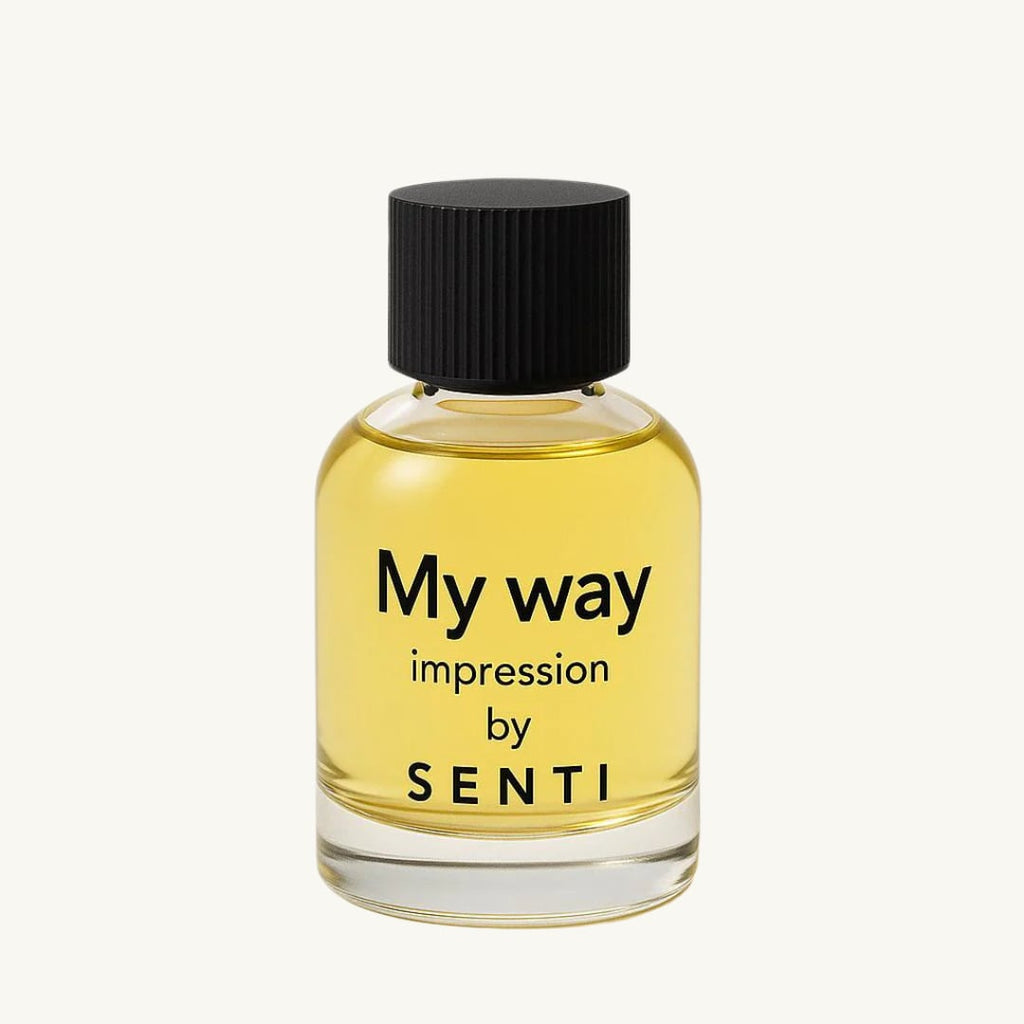 A single clear glass bottle of Senti My Way Impression perfume, featuring a black ridged cap and yellow liquid, against a clean off-white background.
